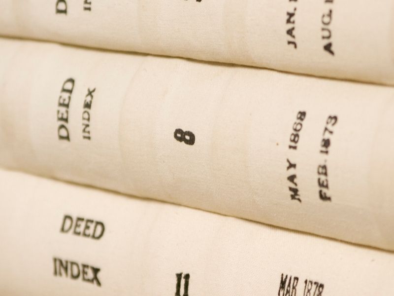 Property survey cost research involving older deed records and historical property documents in Cincinnati Ohio